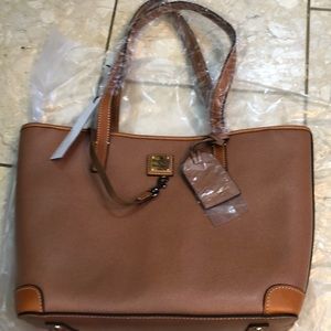 Brand new never used Dooney & Burke Charleston